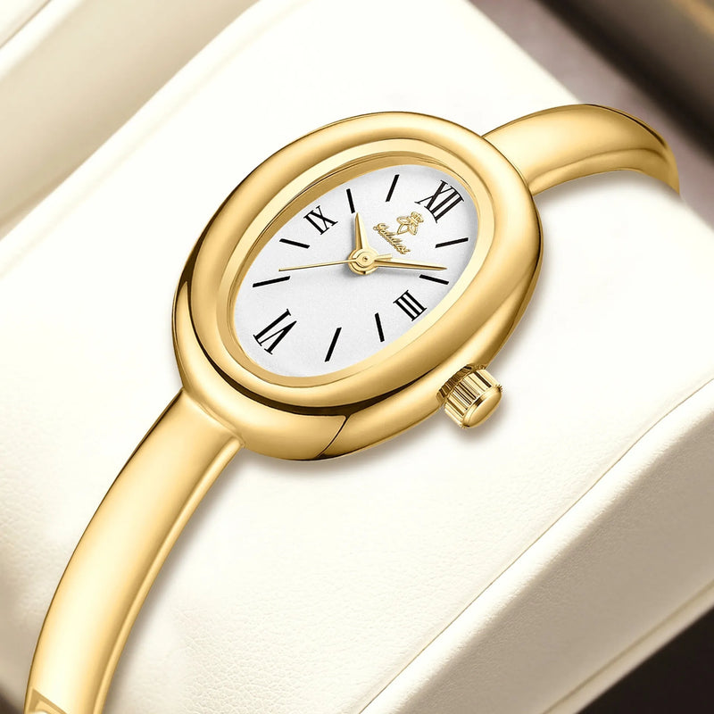 Women's Quartz Watch with oval retro case design in 8mm thickness, available in multiple colour combinations including gold, silver, black and red finishes, suitable for fashion-focused everyday wear and gifting