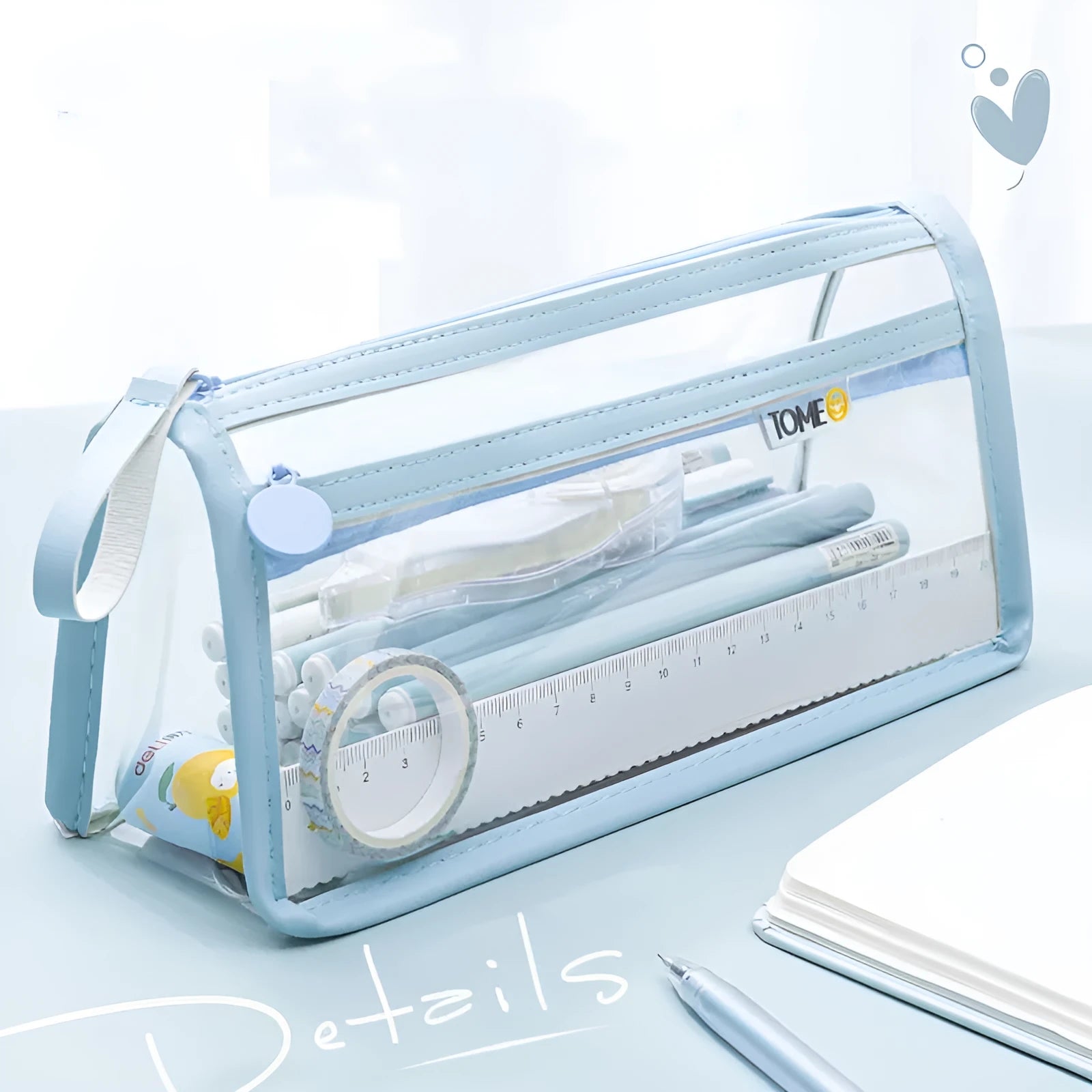 Transparent double-layer pencil case in blue showing organised stationery inside compartments