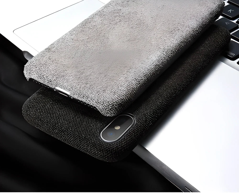 FLOVEME Textile Cloth iPhone Case in dark grey color, featuring a unique and stylish design for enhanced protection and sophisticated elegance.
