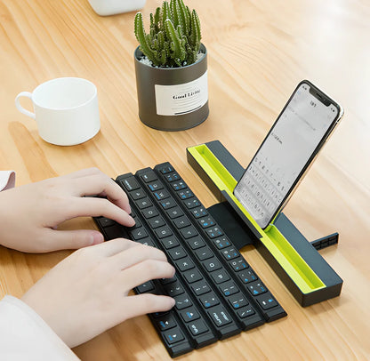 Portable wireless Bluetooth rolly keyboard with folding design and built-in device stand for tablets and smartphones