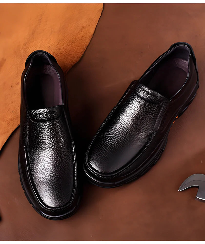 Genuine leather casual loafers for men with a sleek, streamlined silhouette and slip-on design for easy wear and all-day comfort.