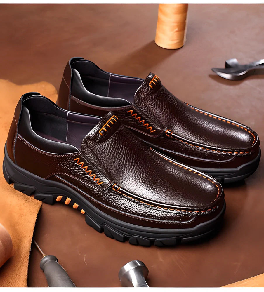 Genuine leather casual loafers for men with a sleek, streamlined silhouette and slip-on design for easy wear and all-day comfort.