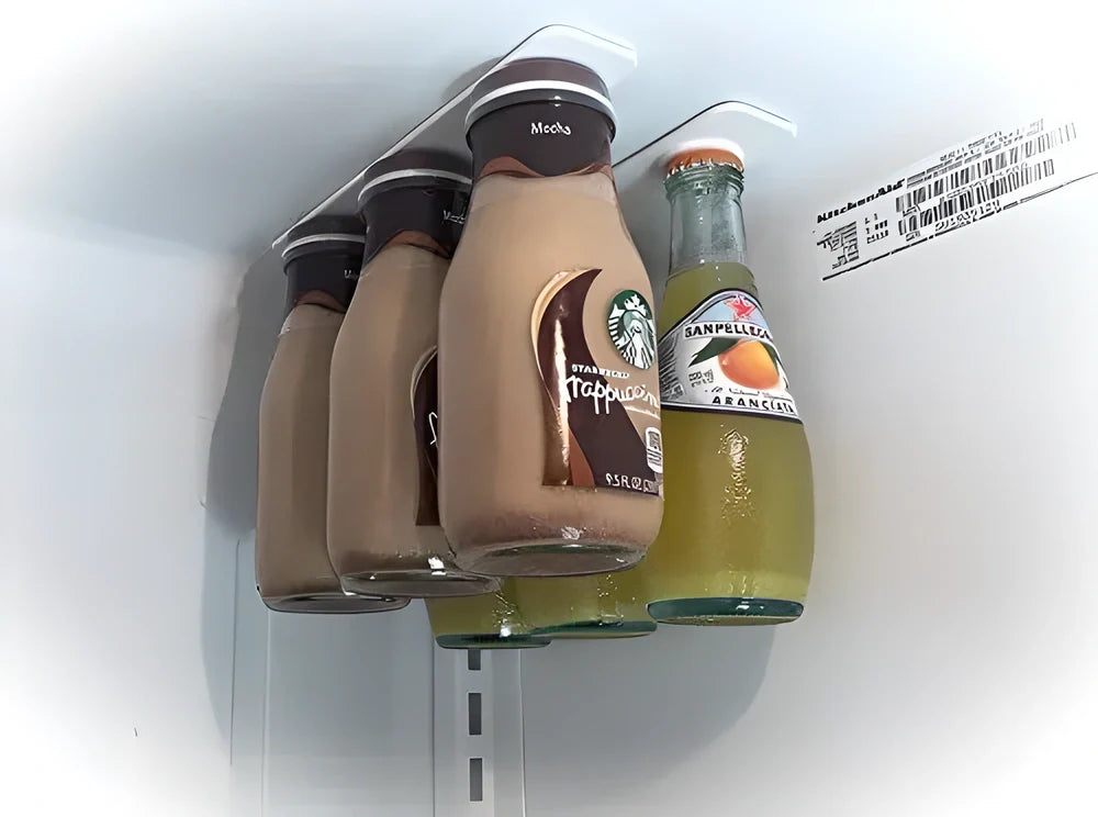 Magnetic Beer Holder suspending beverage bottles from fridge ceiling, maximizing storage space