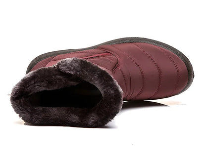 A pair of women's waterproof and warm winter boots in a variety of colors, including black, red, blue, and brown.