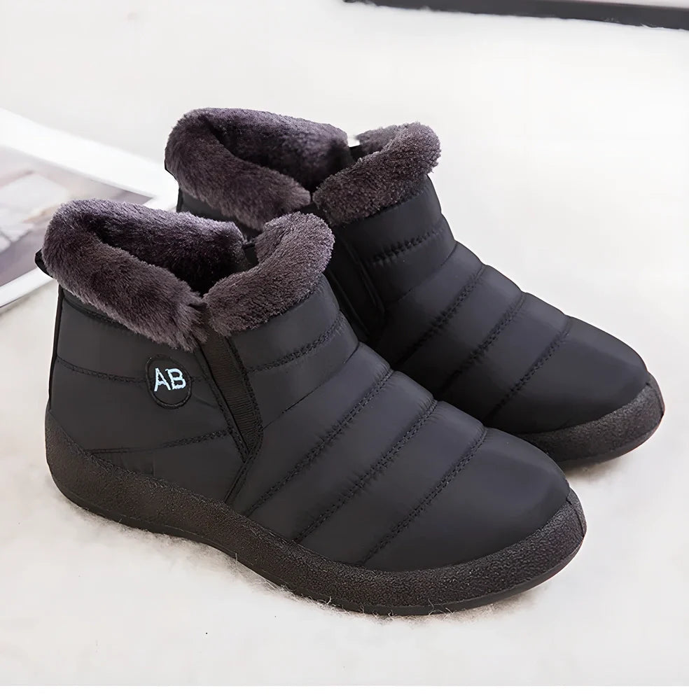 A pair of women's waterproof and warm winter boots in a variety of colors, including black, red, blue, and brown.