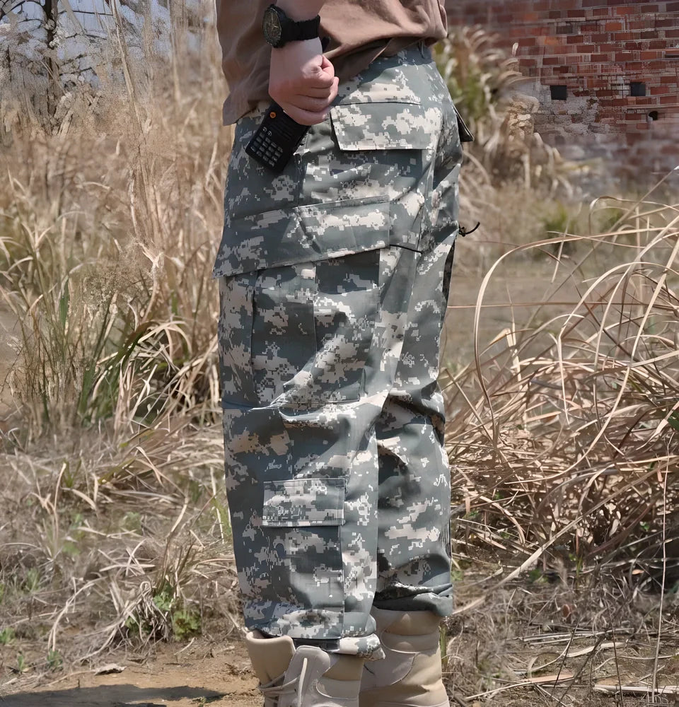 Durable and versatile camo cargo pants with reinforced knees, adjustable waistband, and multiple pockets